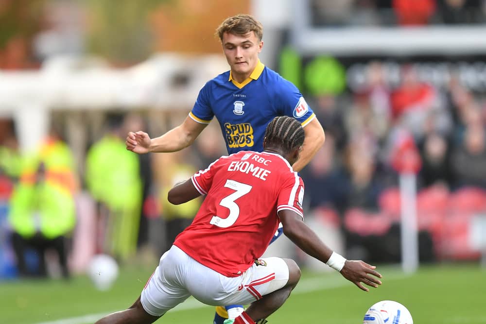 Preston North End's Ed Nolan battles with  Wrexham's Jacques Ekomie