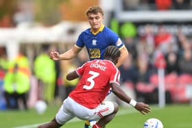 Preston North End's Ed Nolan battles with  Wrexham's Jacques Ekomie