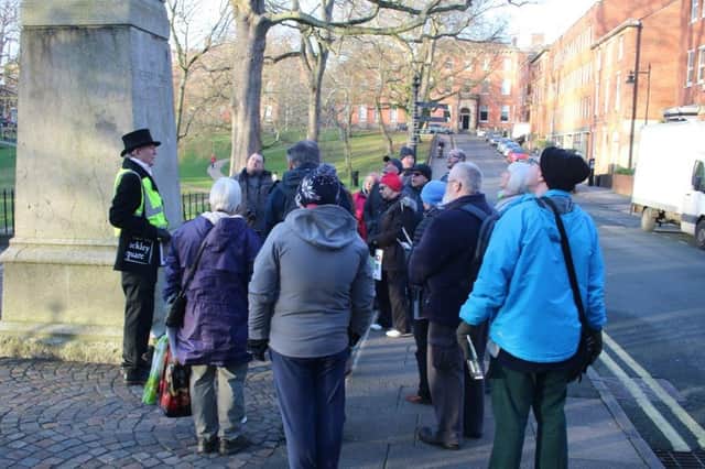 Guided walk Peter Wilkinson leading a guided heritage walk for former residents of Winckley Square
