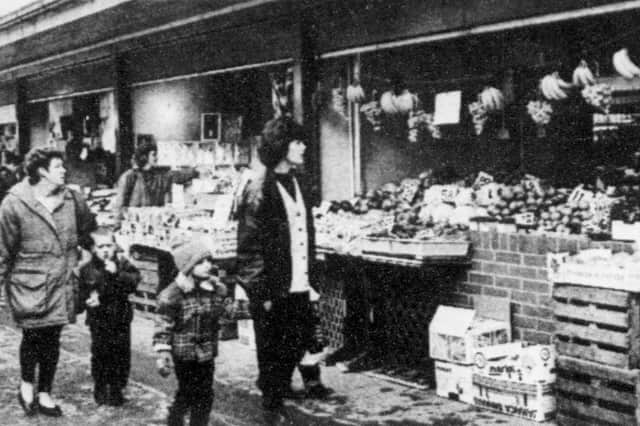Shoppers browse the fruit and vegetable stalls at Chorley Market in 1994, when the town still enjoyed a thriving traditional market trade