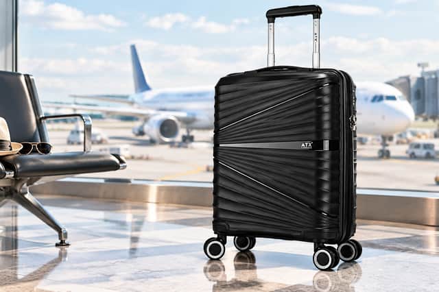 The black ATX Luggage 21-inch cabin suitcase has a 44-litre capacity, four double spinner wheels and a built-in TSA-approved lock.