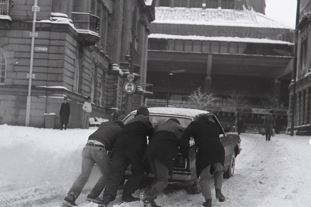 A winter wonderland – but not for motorists! A car is pushed through the snow on Preston’s Flag Market in 1981, as our nostalgic photo series revisits the people, places and memorable moments of the Eighties  