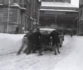 A winter wonderland – but not for motorists! A car is pushed through the snow on Preston’s Flag Market in 1981, as our nostalgic photo series revisits the people, places and memorable moments of the Eighties  