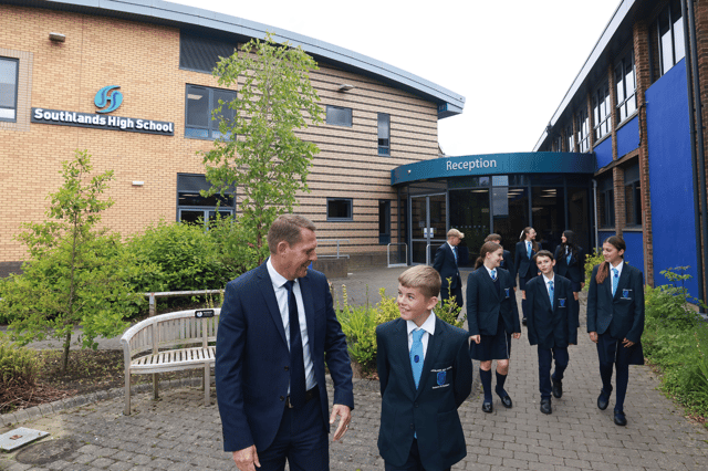 Southlands headteacher Paul Bousfield with pupils outside the school