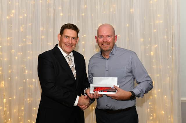 Craig Jardine (R), celebrates more than 40 years of service. Pictured with MD Phil Jones (L).