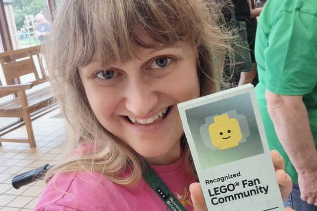 Charlii Langley with her Lego Fan Community badge