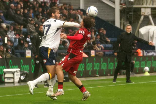 Graham Alexander watches the action.