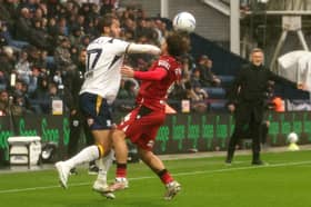 Graham Alexander watches the action.