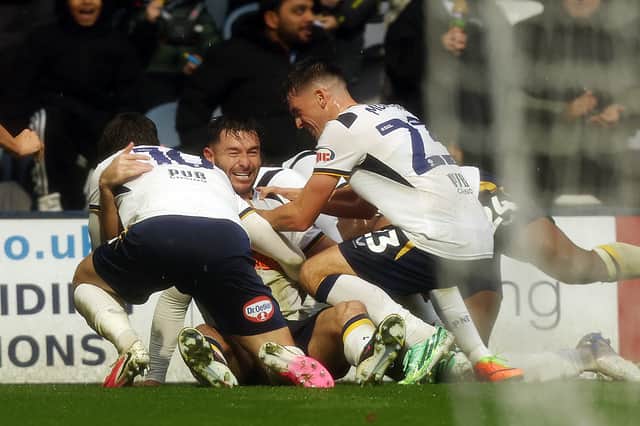 Preston celebrate Andrew Hughes' goal.