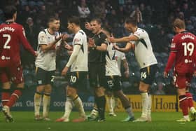 Preston North End players remonstrate with referee Elliot Bell