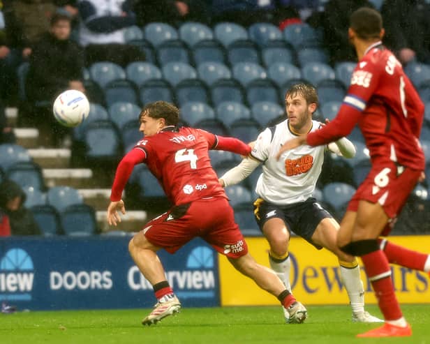 West Bromwich Albion's Callum Styles vies for possession with Preston North End's Stanley Mills