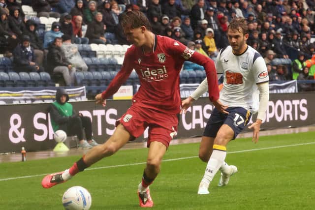 West Bromwich Albion's Isaac Price under pressure from Preston North End's Stanley Mills.