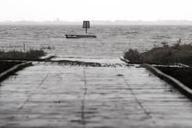Lytham Jetty has broken in two, causing major disruption for Ribble Cruising Club. Pictured at high tide, with part of the debris floating in the sea. Photo: Lucinda Herbert