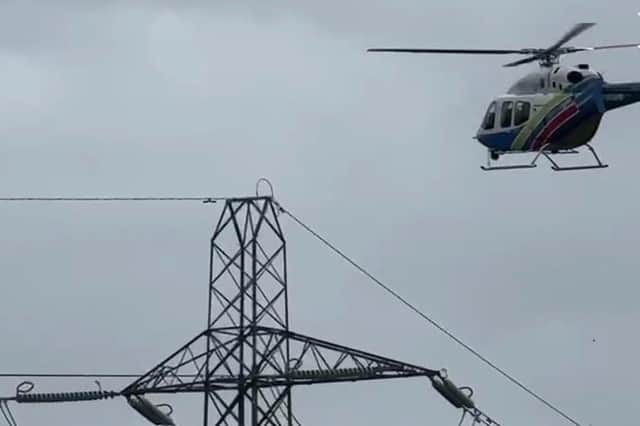 A helicopter has been spotted this morning hovering over Preston Marina checking power lines following storm damage