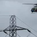 A helicopter has been spotted this morning hovering over Preston Marina checking power lines following storm damage 