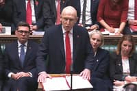 Chancellor of the Exchequer John Healey delivers his Budget speech in the House of Commons.