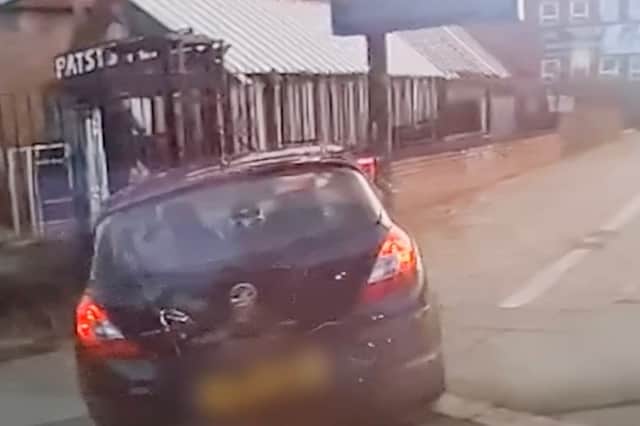 Still from dash cam footage depicts the moment Hawkar Karimi smashes into the back of black Volkswagen at Edge Lane junction.