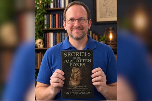 Preston author Ian Stagg Andrew with 'Secrets of the Forgotten Bones, the second book in his 'The Forgotten Bones Trilogy'.