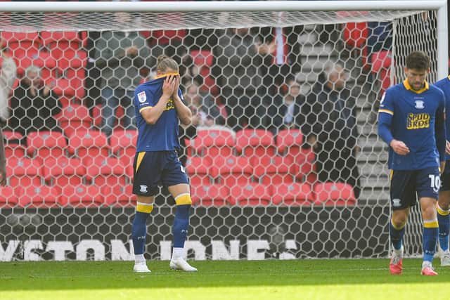 Preston North End's Brad Potts reacts after his team go down 1-0