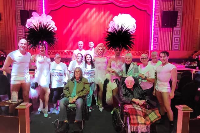 Residents with the drag queens at Funny Girls