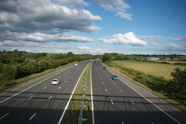 Cars driving on a motorway.