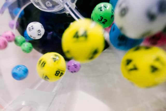 Lottery balls in a mixing machine.