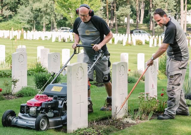 Commonwealth War Graves Commission (CWGC) of staff working on the maintenance on one of the organisation's 23,000 memorial and cemetery sites around the world. CWGC/PA Wire.
