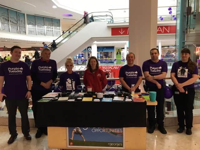 Volunteers at Galloway's go purple