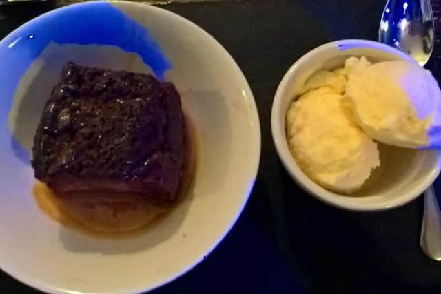 Sticky toffee pudding with ice cream