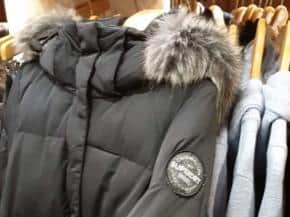 The coat is described as an extra small, black Superdry parka-style coat (pictured), with a fur-style hood. Pic: Lancashire Post