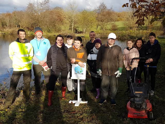Children from Rumworth School in Bolton with their teachers, plus Ian Loftus and Warren Kozera (of LifeScape) and Dan Hames (founder of This is CLaSS)