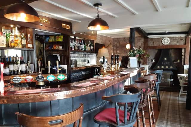 The cosy bar of the Queens Head is the perfect resting place after a day amongst the fells