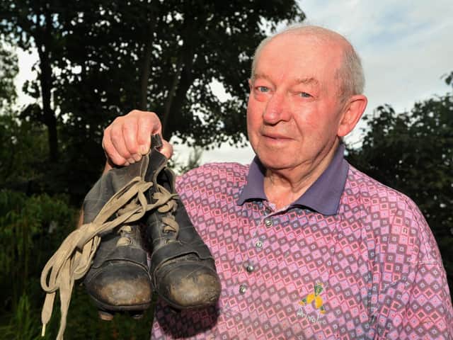 Les Campbell with the boots he wore on his Preston debut in 1953