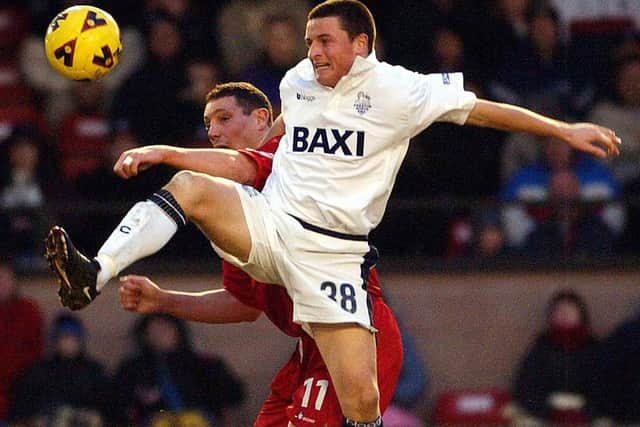 Michael Keane challenges for the ball in Preston's win at Walsall in January 2002