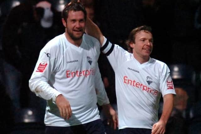 Paul McKenna reaches to congratulate Jon Parkin who scored alongside Sean St Ledger in a 2-0 win in 2008.