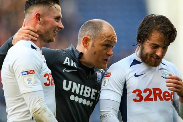 Preston manager Alex Neil with Alan Browne (left) and Ben Pearson