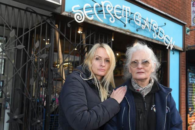 Joan (right) and her daughter Melissa (left) outside their ransacked flower shop in Adelphi Street, Preston