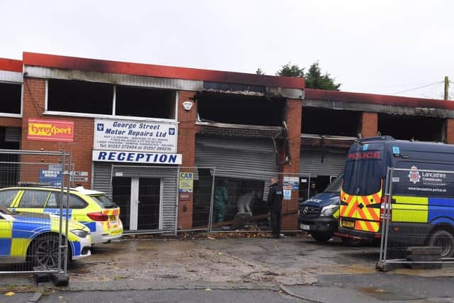 A number of police vehicles descended on George Street Motors in George Street, Chorley this morning