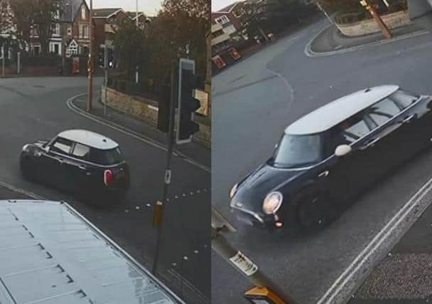 The Mini Cooper is purple in colour with a white roof and white wing mirrors. (Credit: Lancashire Police)
