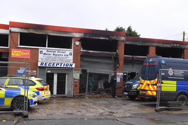 Police have identified the empty George Street Motors as a potential location for the discarded firearm