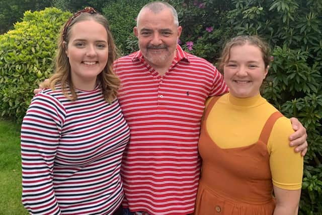 Simon Ashcroft with his daughters Catherine and Ruth