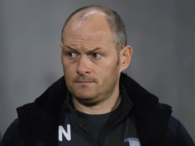 Preston boss Alex Neil looks stern faced as his side are beaten 4-0 at Hull City.