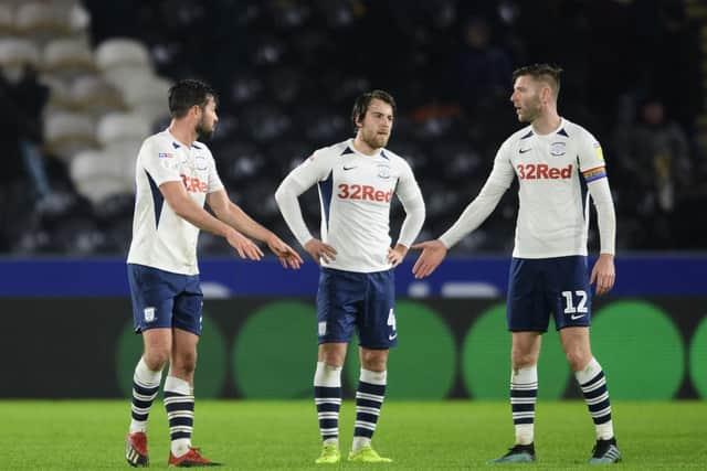 Joe Rafferty, Ben Pearson and Paul Gallagher after Preston conceded the fourth goal at Hull