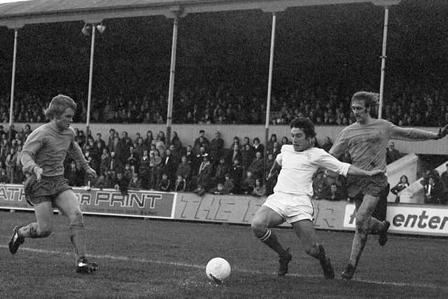 Action from PNE v Huddersfield in 1974 in front of the West Stand