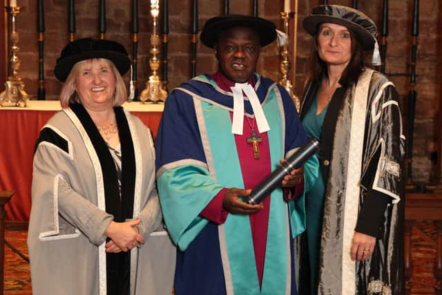 l-r: Professor Diane Cox, director of research at University of Cumbria, with  Chancellor, the Most Revd and Rt Hon Dr John Sentamu, Archbishop of York and Vice Chancellor Professor Julie Mennell after Dr Sentamu was presented with the university's first honorary doctorate, Carlisle Cathedral.