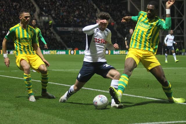 Preston's Sean Maguire battles for possession against West Bromwich Albion defender Semi Ajayi at Deepdale