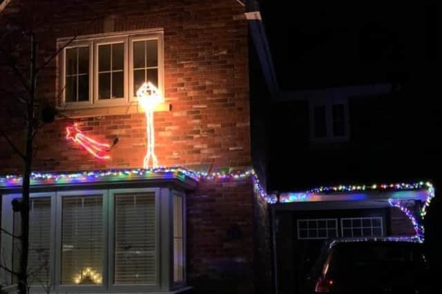 Adam and Lori Shaw's Christmas lights have been described as 'tacky' in an anonymous note left on their car windshield