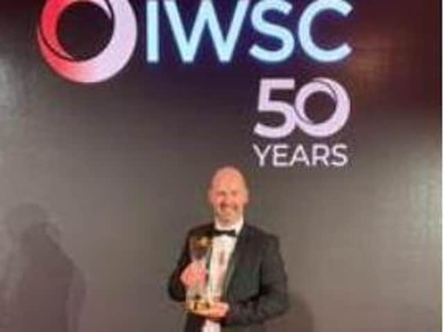 Pete Newton of Booths with the award