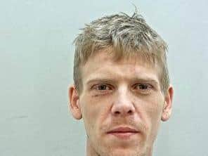 Robert Cross, 31, is wanted in connection with an assault in Preston. (Credit: Lancashire Police)