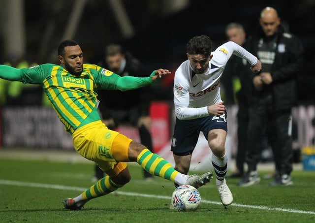 Sean Maguire takes on West Bromwich Albion's Matt Phillips